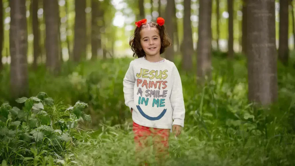 Christian children's clothing for kids, babies, and teenagers Organic T-shirt with "Jesus paints a smile in me" Christian children's clothing for kids, babies, and teenagers Organic T-shirt with "Jesus paints a smile in me"